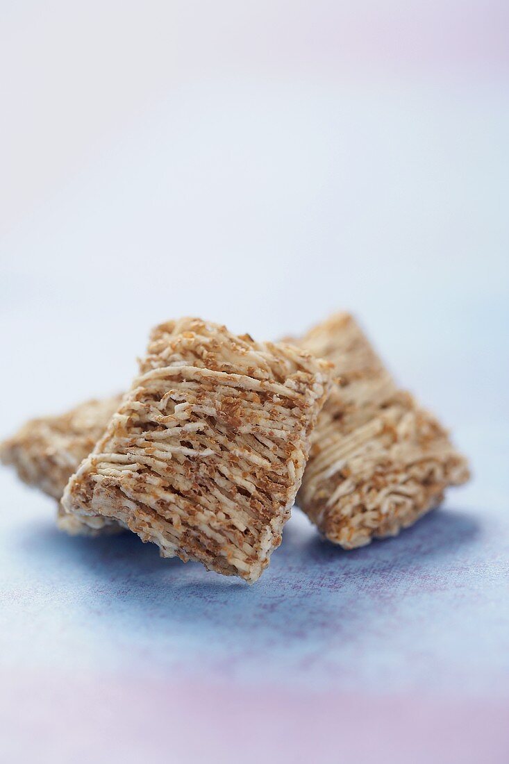Three Pieces of Shredded Wheat Cereal, Close Up