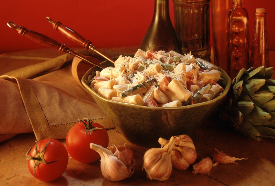 Large Bowl of Rigatoni with Asparagus and Tomatoes in a Cream Sauce with Parmesan