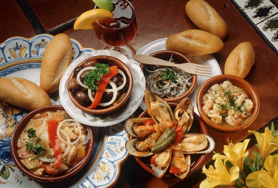 An Assortment of Tapas with Rolls