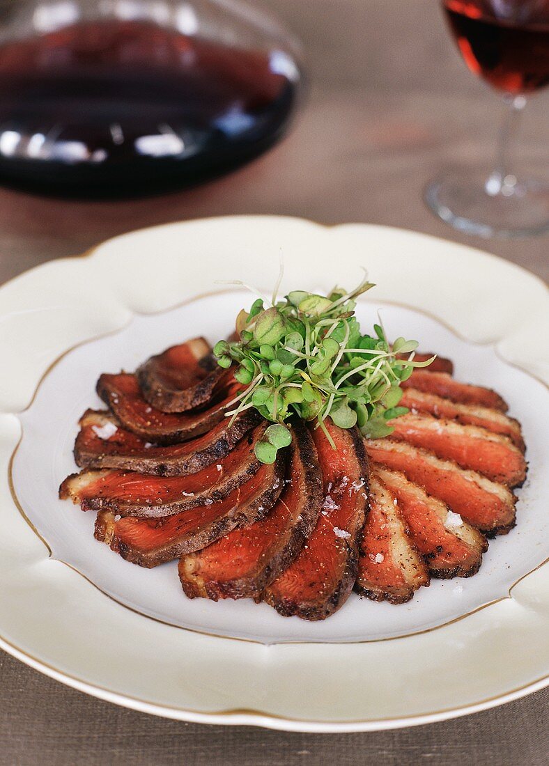 Plate of Sliced Spice Crusted Duck Breast