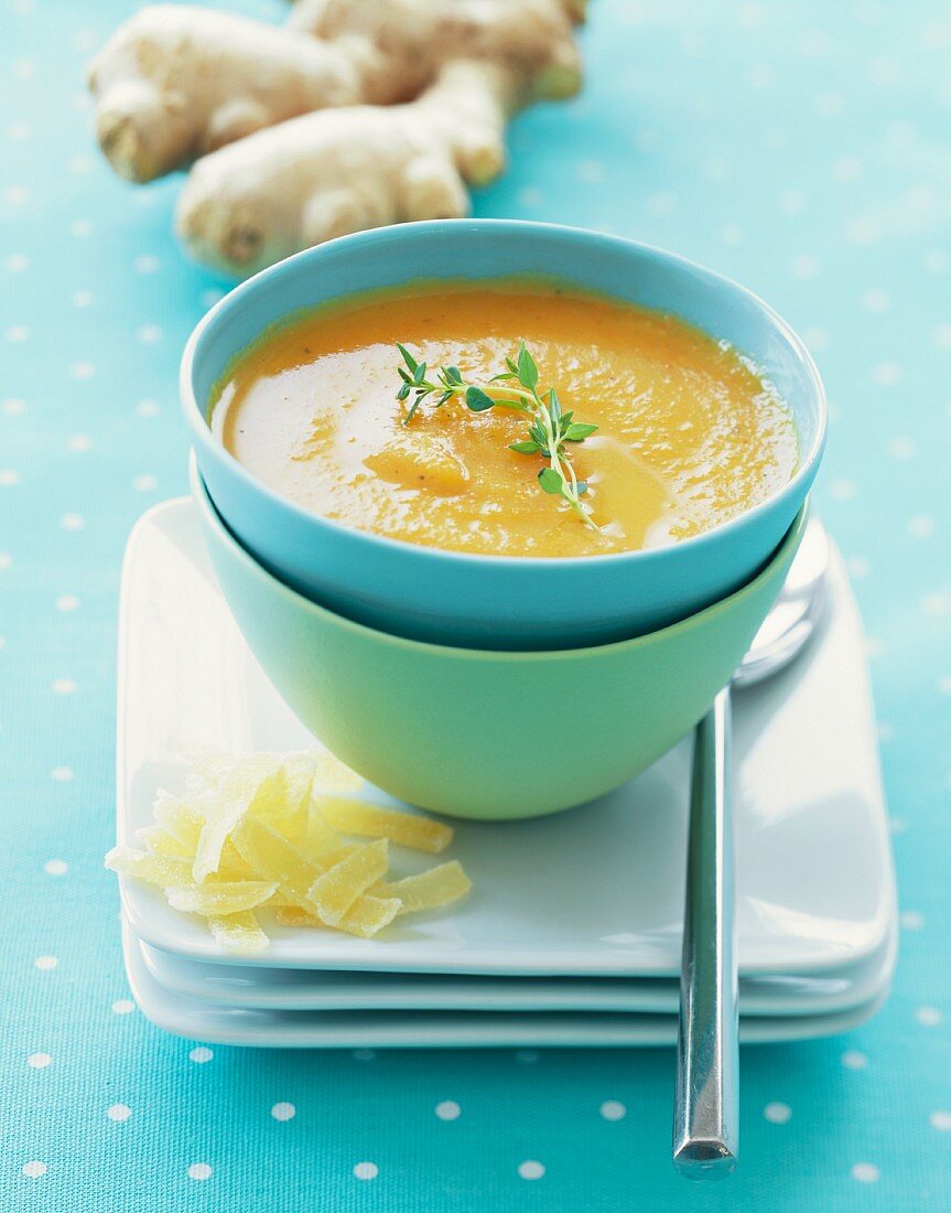 A Bowl of Carrot, Orange and Ginger Soup, Stacked Bowls