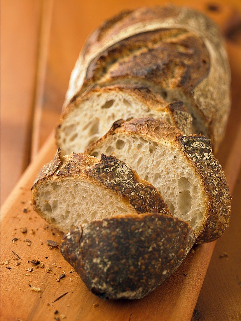 Partially Sliced Loaf of Artisan Bread