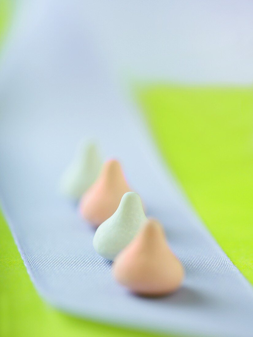 Row of Pastel Candy Covered Chocolates