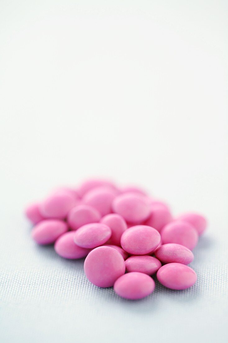 Small Pile of Pink Candy Coated Chocolates
