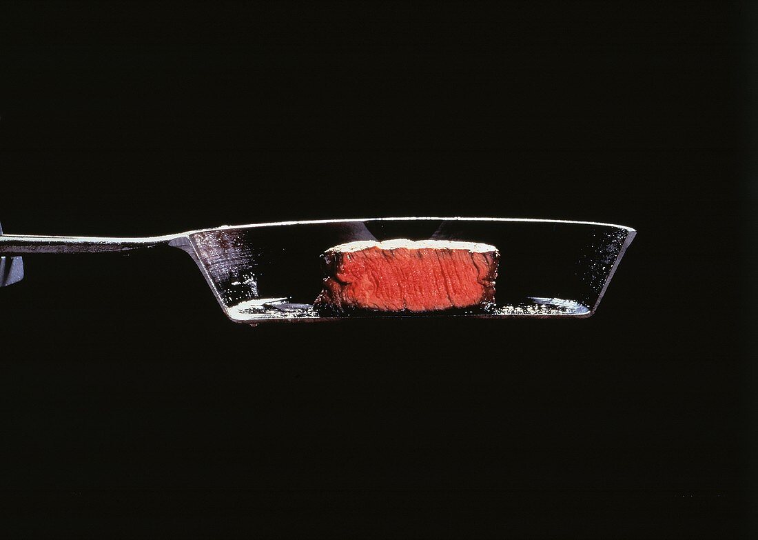 Cross Sectioned Cooked Thick Steak (Chateaubriand) in a Pan
