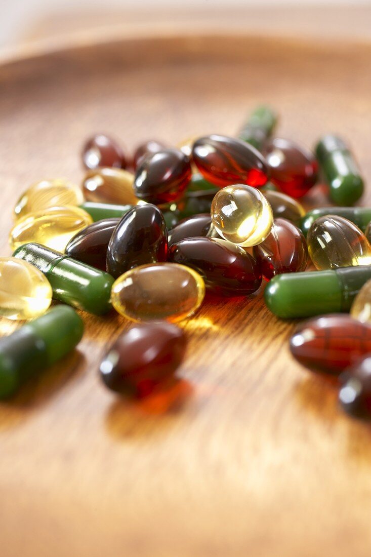 Assortment of Oil Capsules and Vitamins