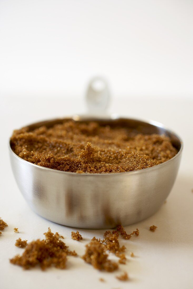 Measuring Cup Packed with Brown Sugar