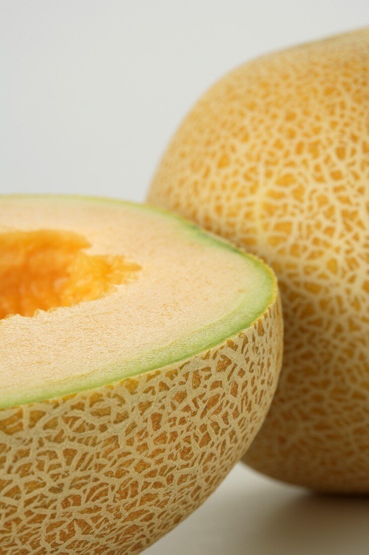 Half a Cantaloupe with a Whole Cantaloupe