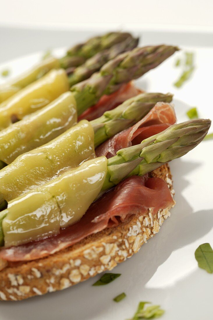 Prosciutto and Asparagus Sandwich Topped with Melted Cheese