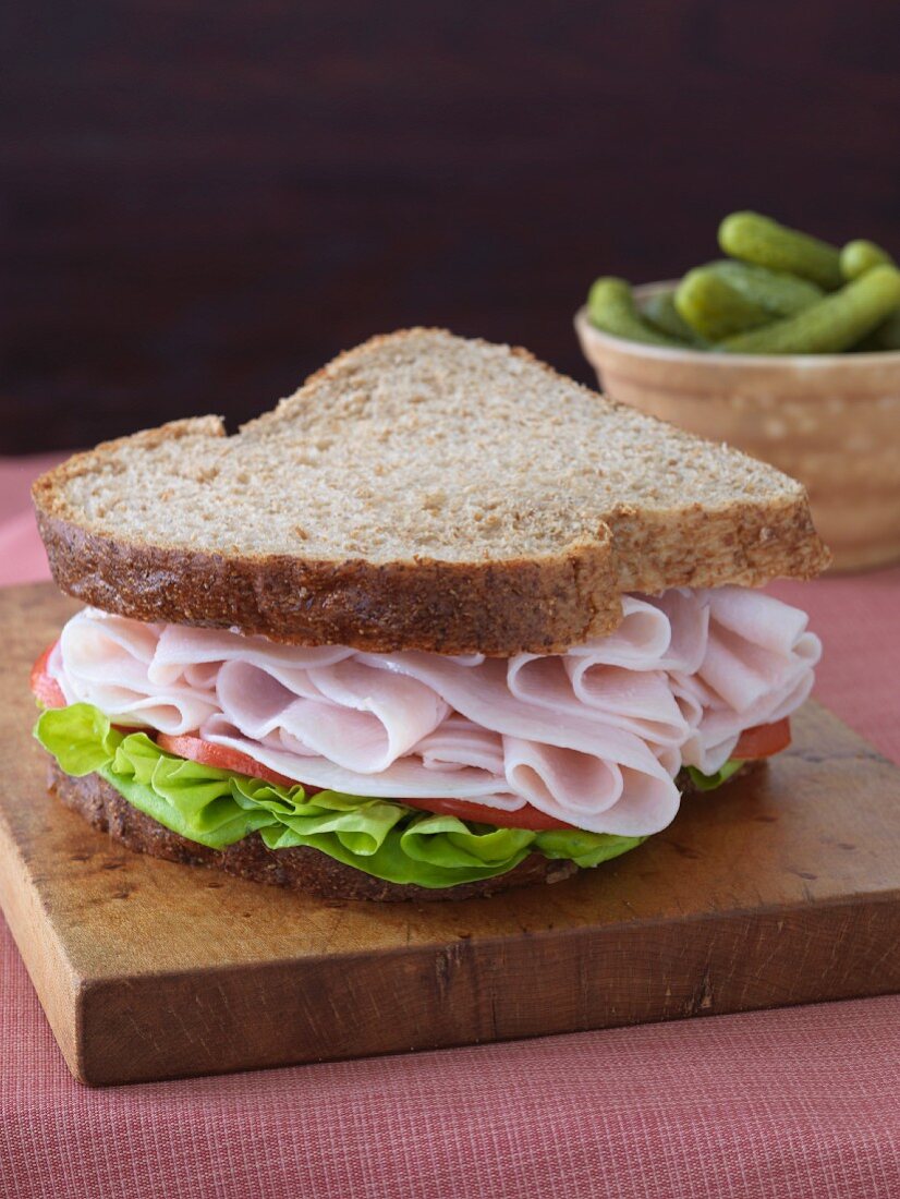 Turkey Sandwich with Lettuce and Tomato on Wheat Bread