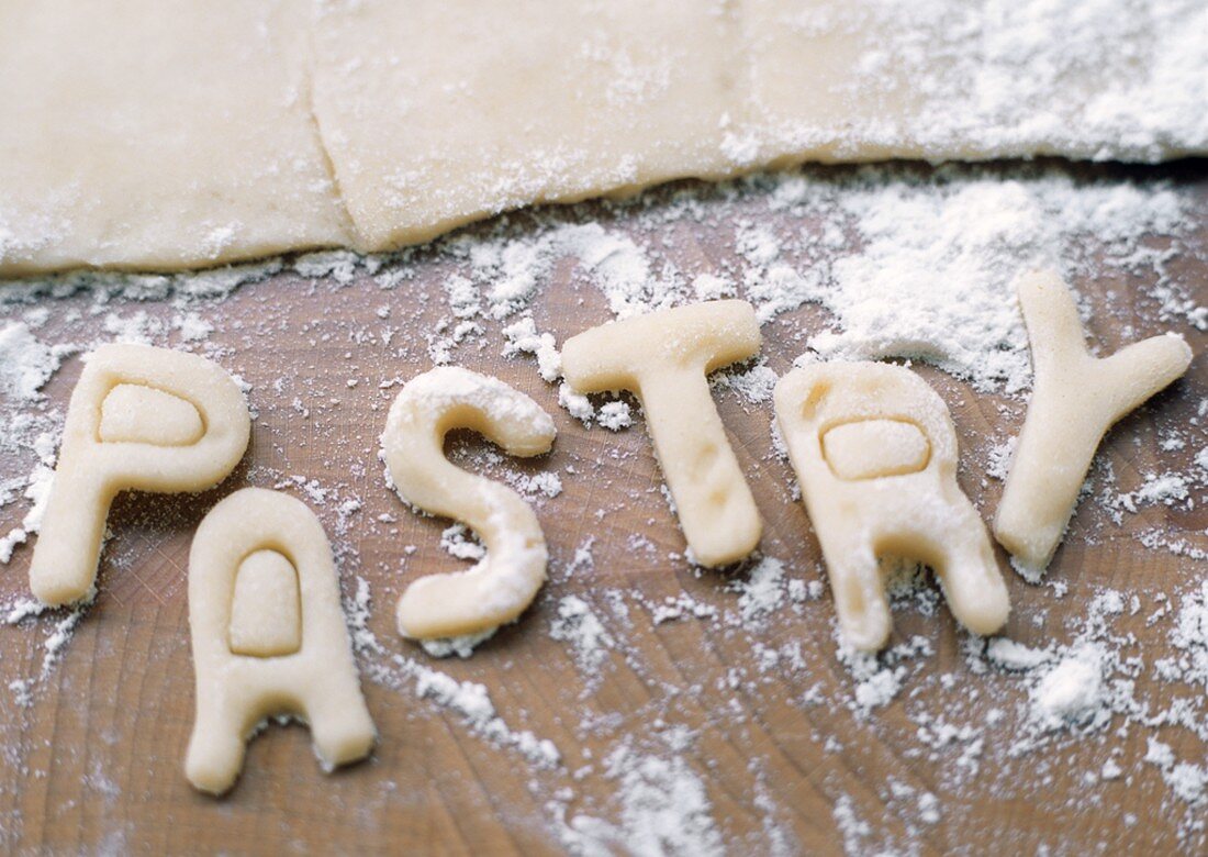 Word Pastry Spelled out with Pastry Dough, Uncooked