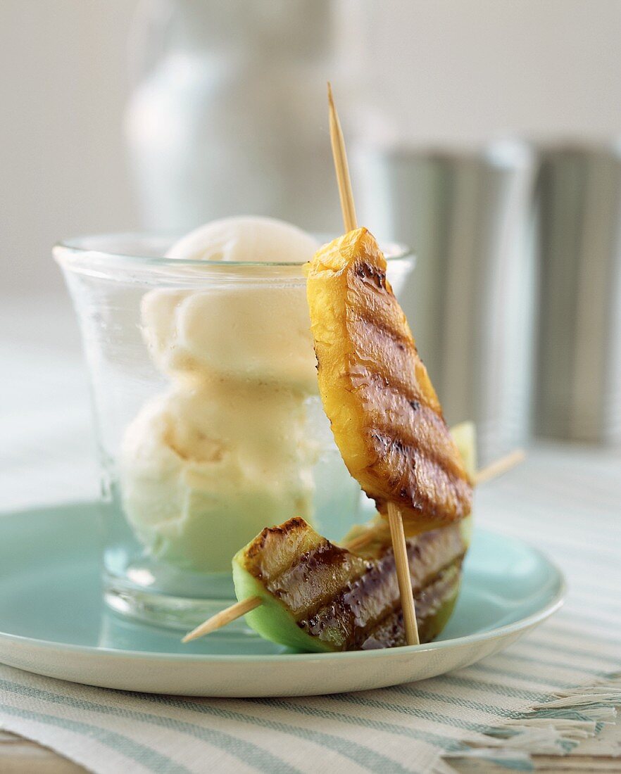 Skewered and Grilled Pineapple and Apple with Vanilla Ice Cream