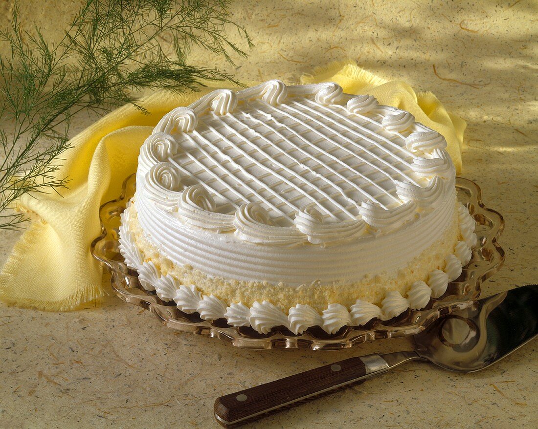 A Yellow and White Frosted Cake