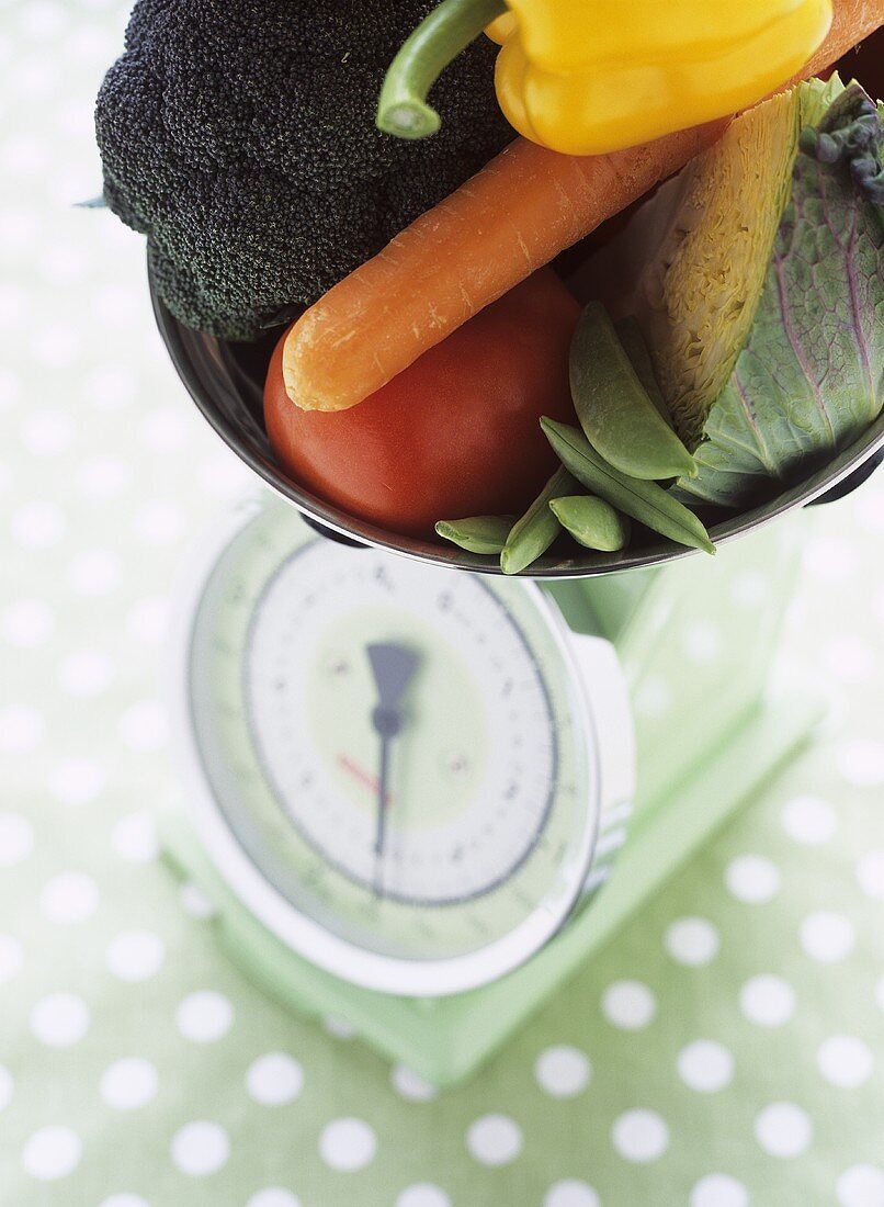 Various types of vegetables on scales