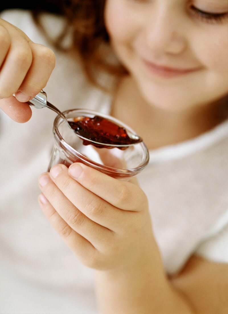 Girl eating jelly