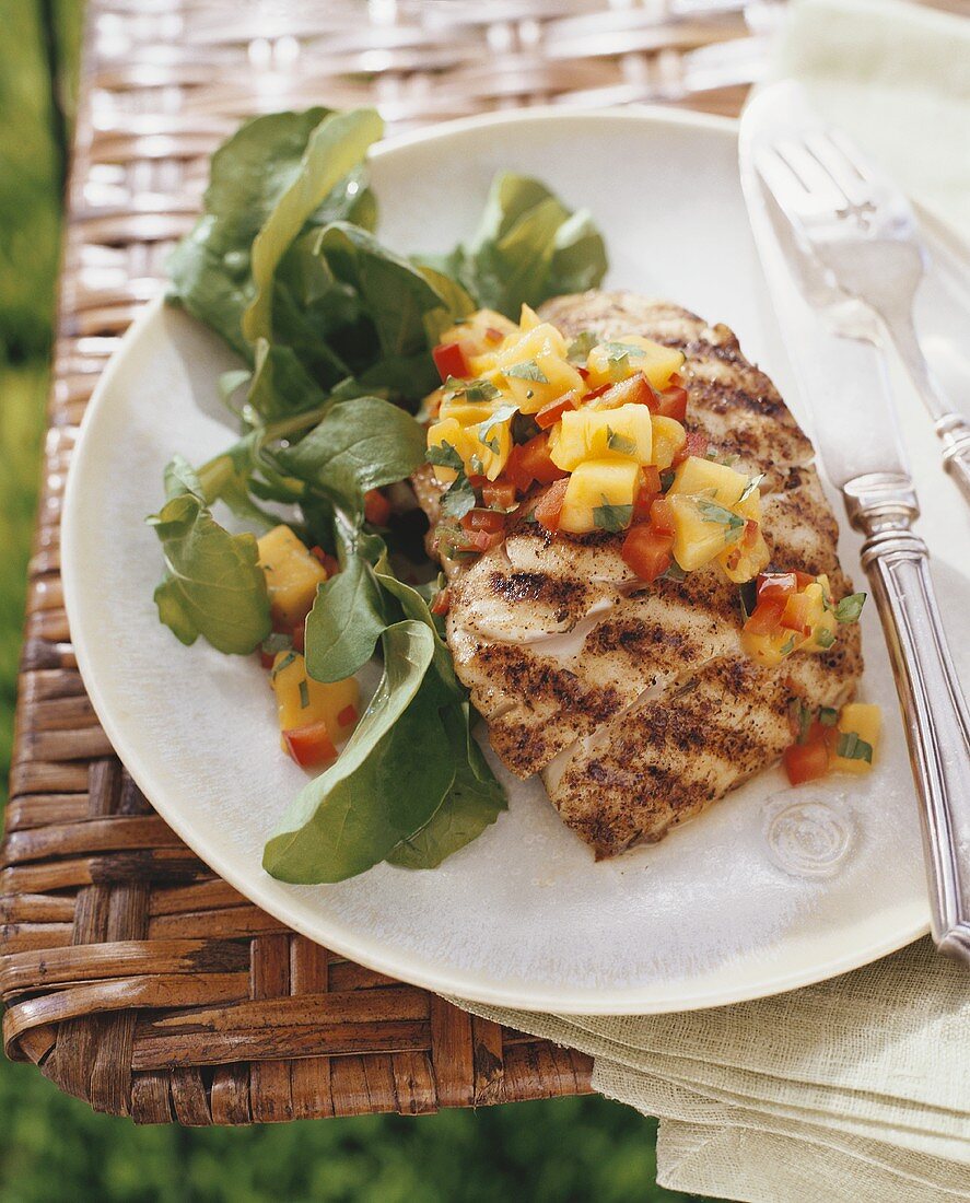 Grilled fish with mango salsa
