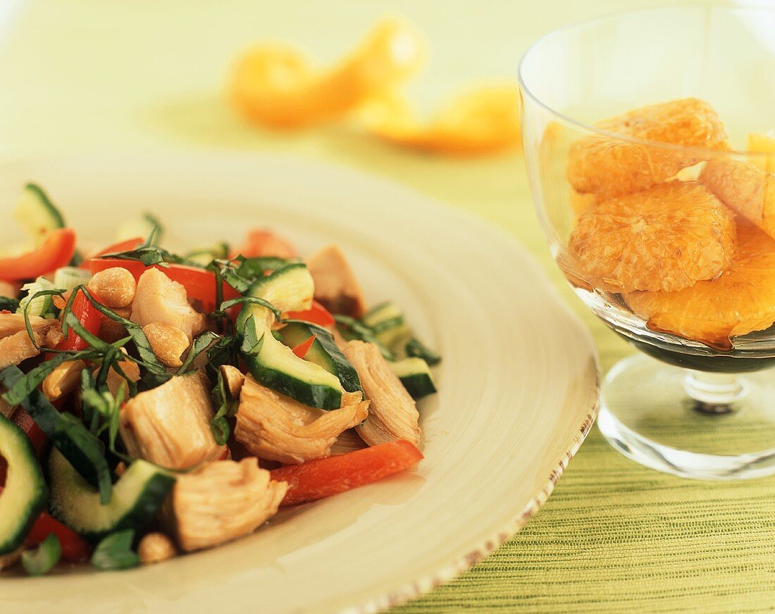 Roasted Thai Chicken Salad; Balsamic Splashed Clementines in a Glass Bowl