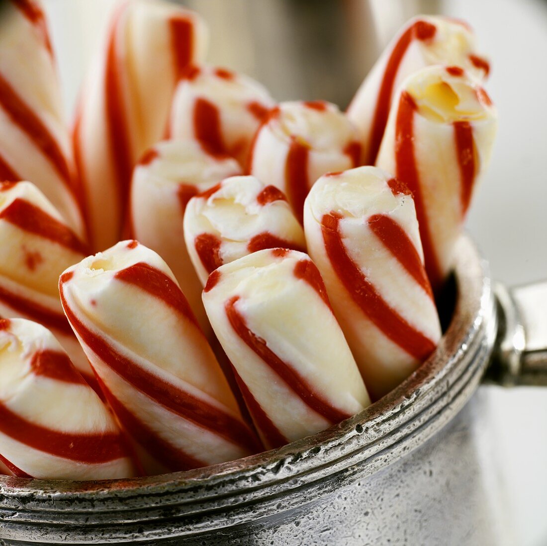 Peppermint sticks in metal pot