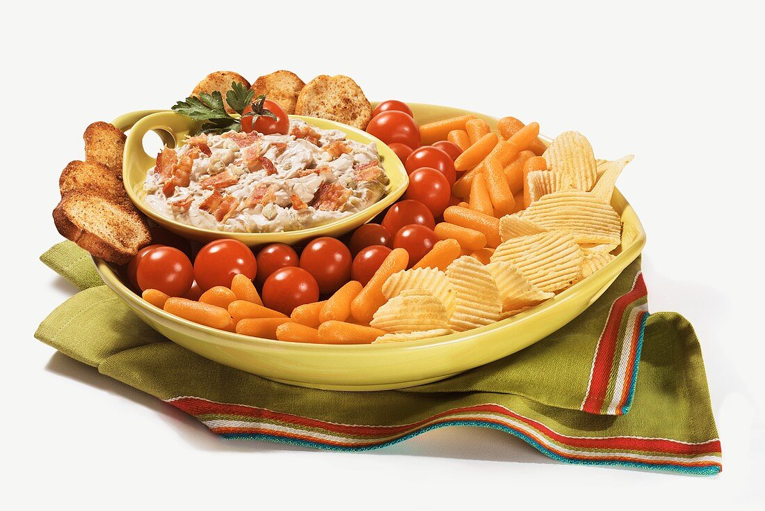 Blue Cheese Dip with Chips, Carrots, Tomatoes and Bread Slices