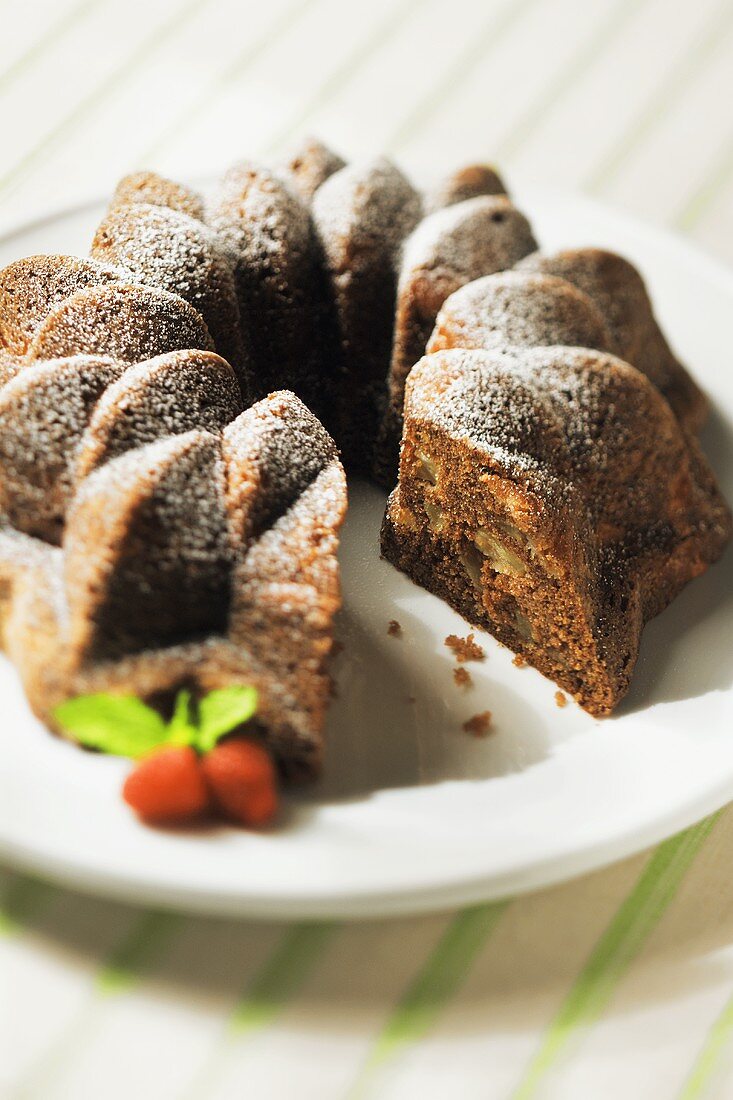 An Apple Spice Bundt Cake with Slice Removed