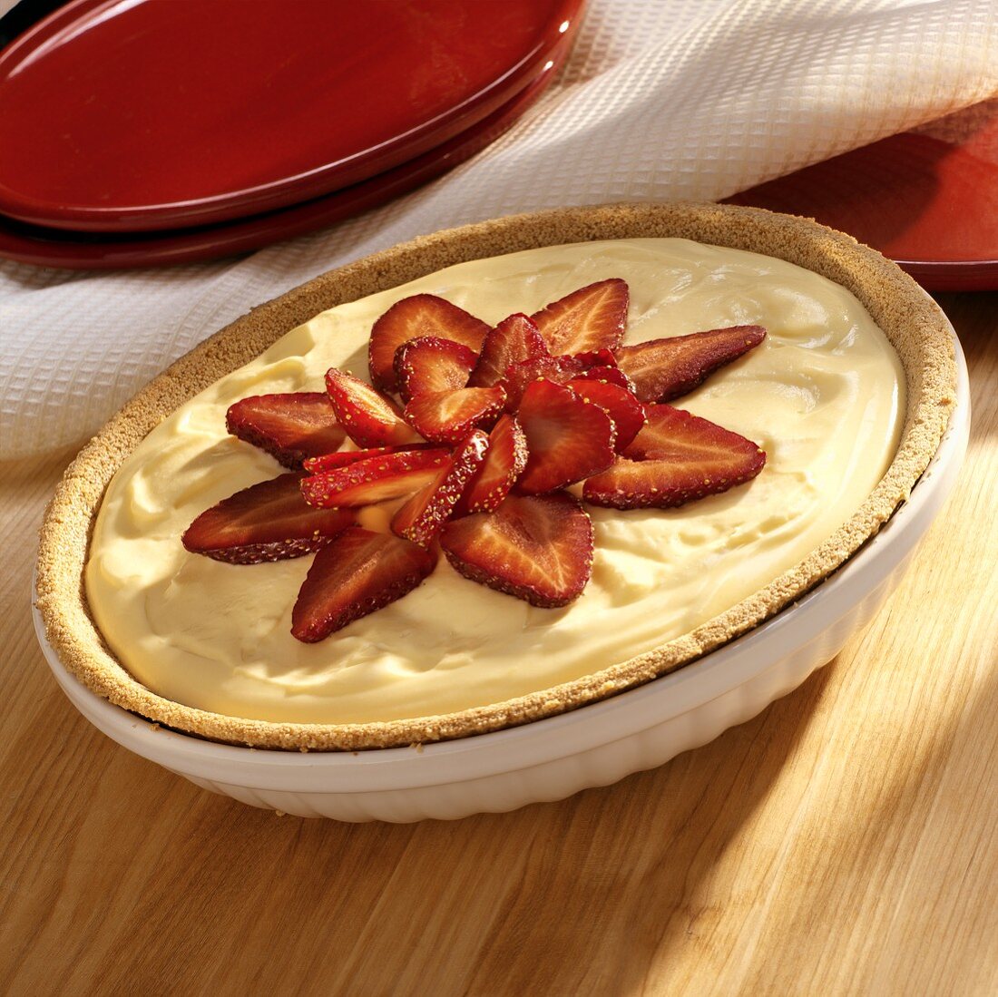 Lemon blancmange and strawberry tart