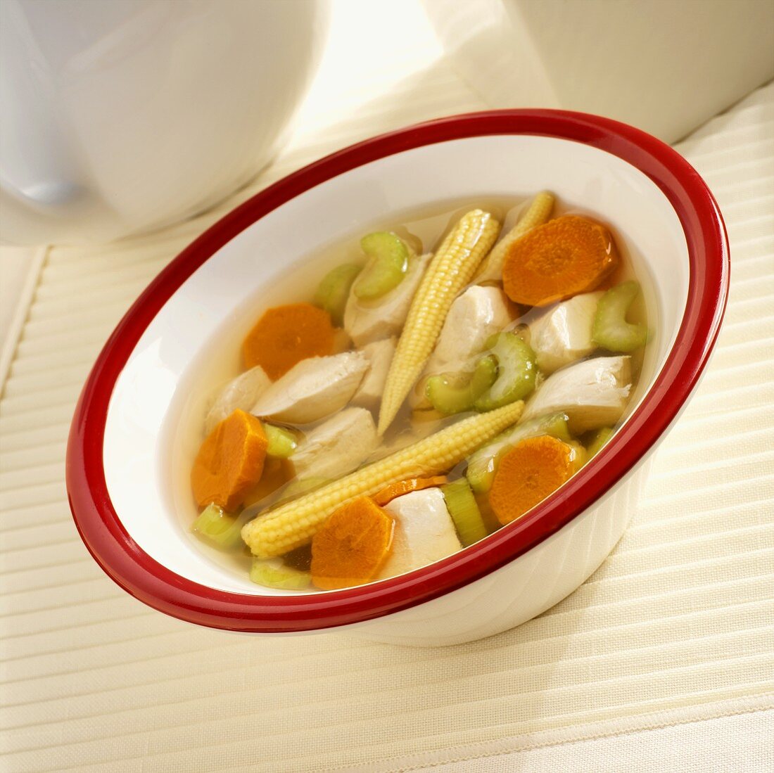 Clear broth with chicken, sweetcorn, carrots and celery