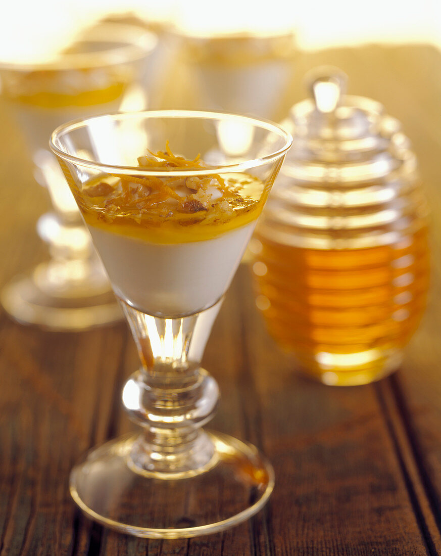 Yoghurt with honey in dessert glass