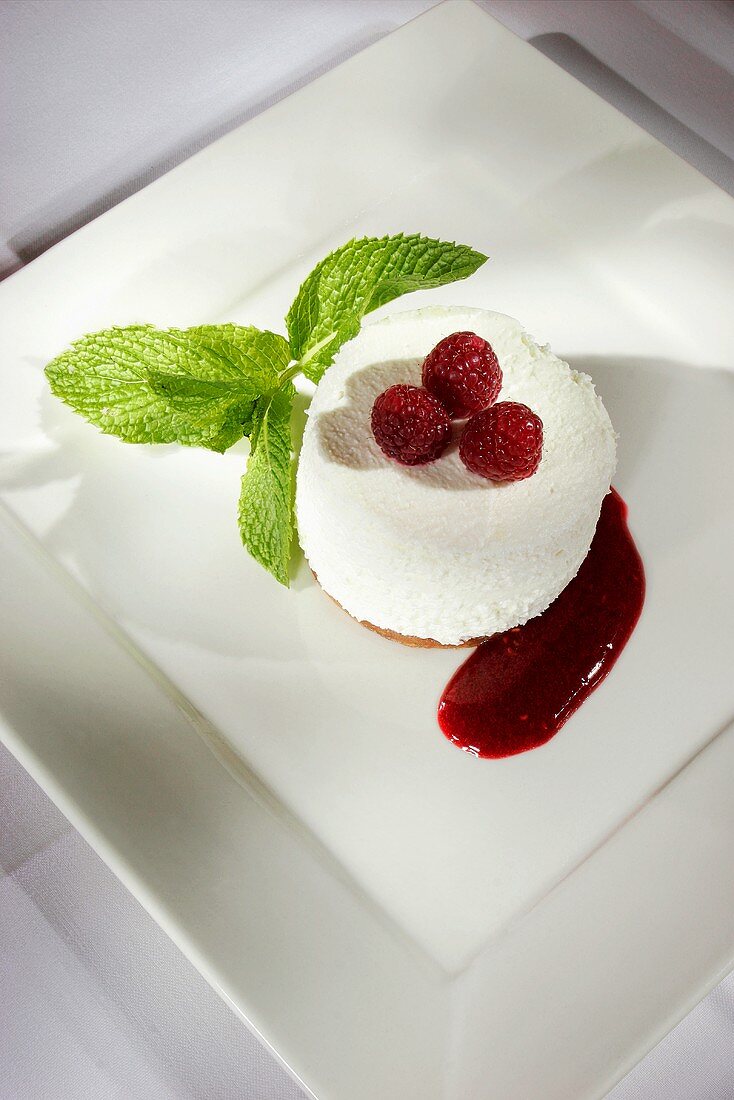 Mascarpone dessert with raspberries and mint