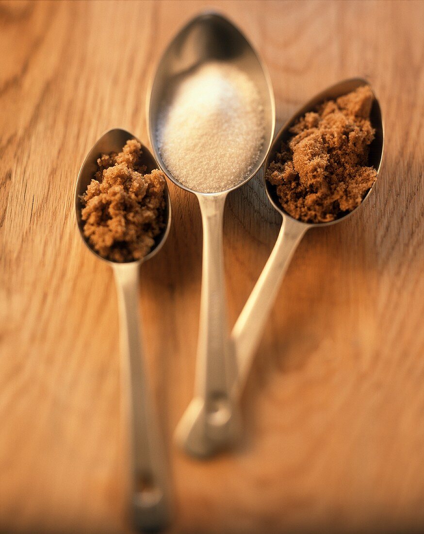 Measuring Spoons with Brown Sugar and White Sugar