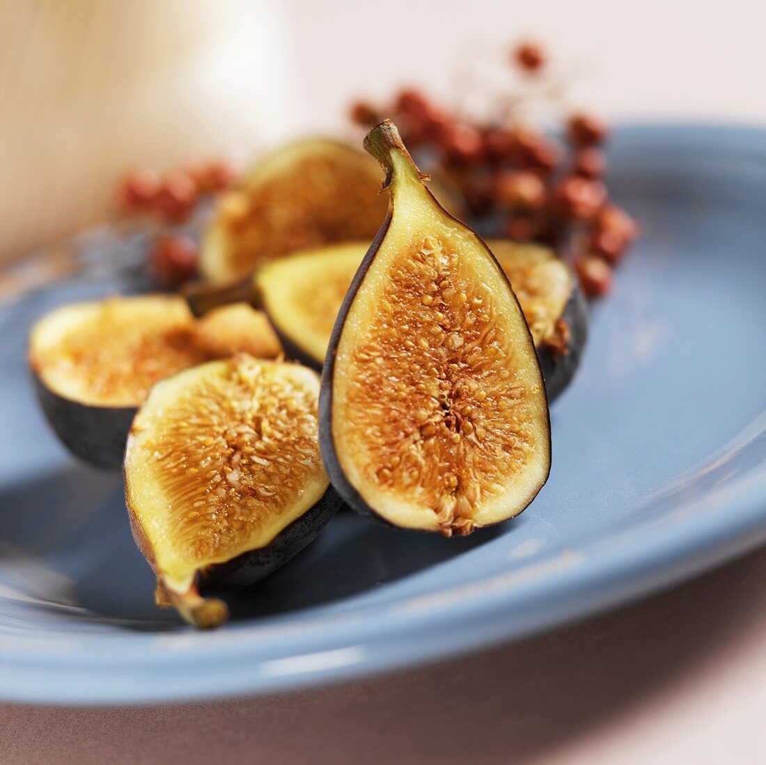 Sliced Figs on a Blue Plate