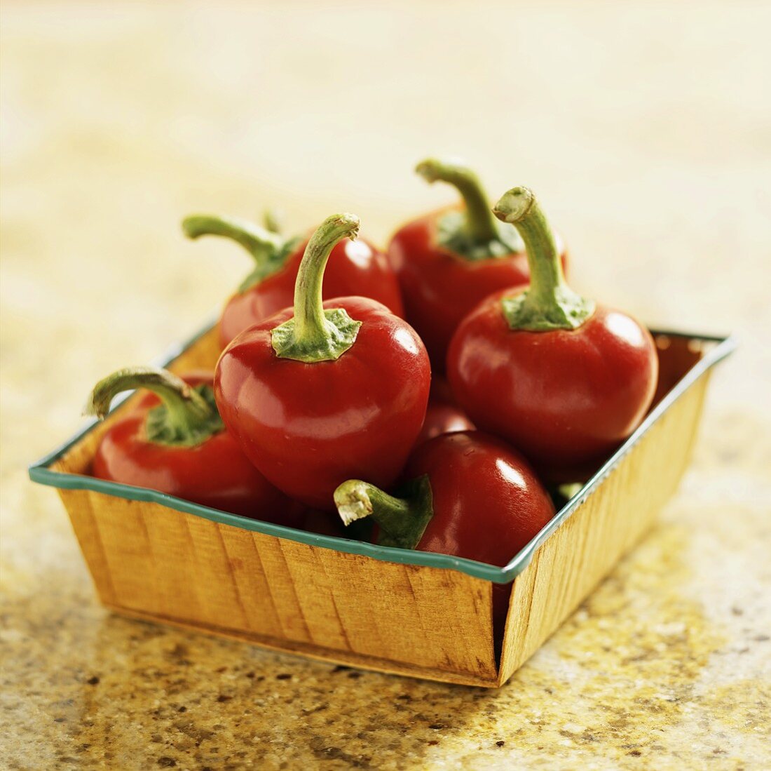 Fresh Cherry Peppers in a Small Square Container
