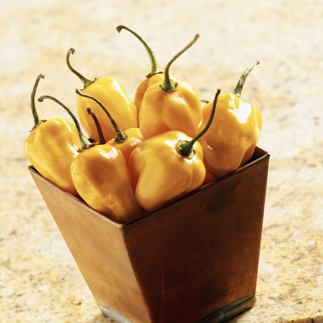 Yellow Habanero Peppers in a Copper Container