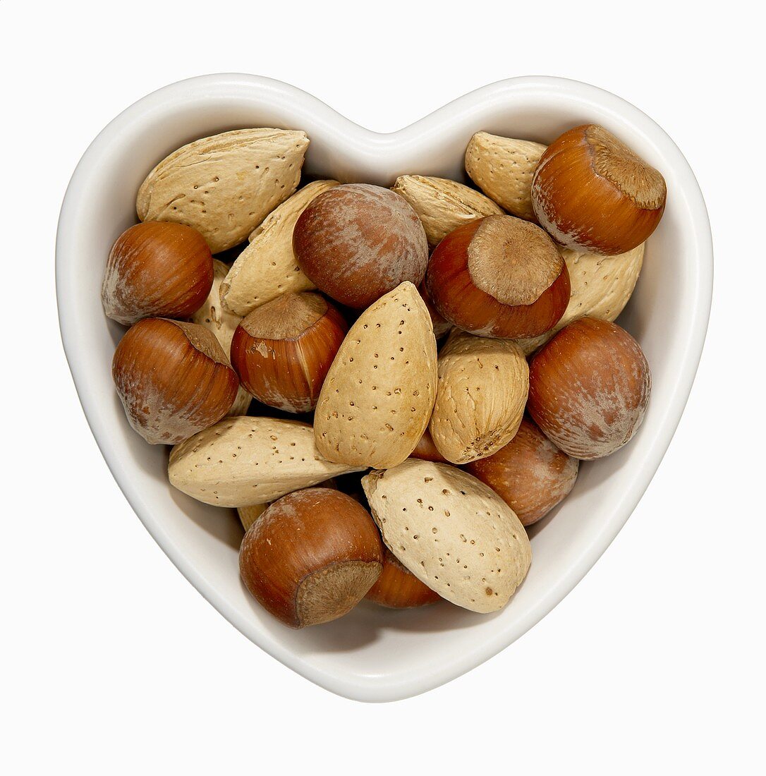 Hazelnuts and Almonds in a Heart Shaped Bowl