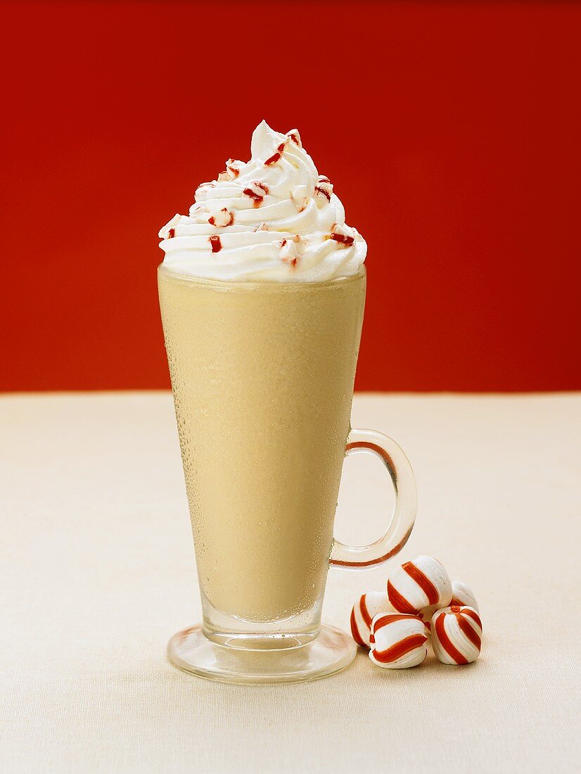 A Peppermint Latte with Whipped Cream and Peppermint Candies
