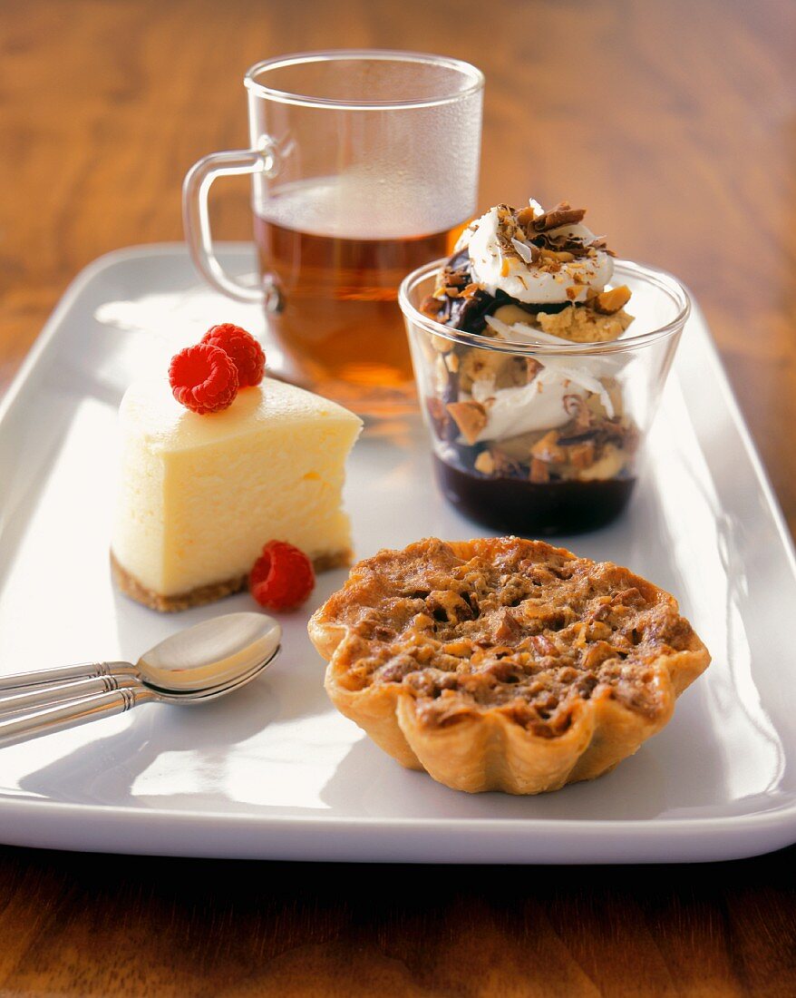 Bite Sized Desserts on a Rectangular White Platter with Tea