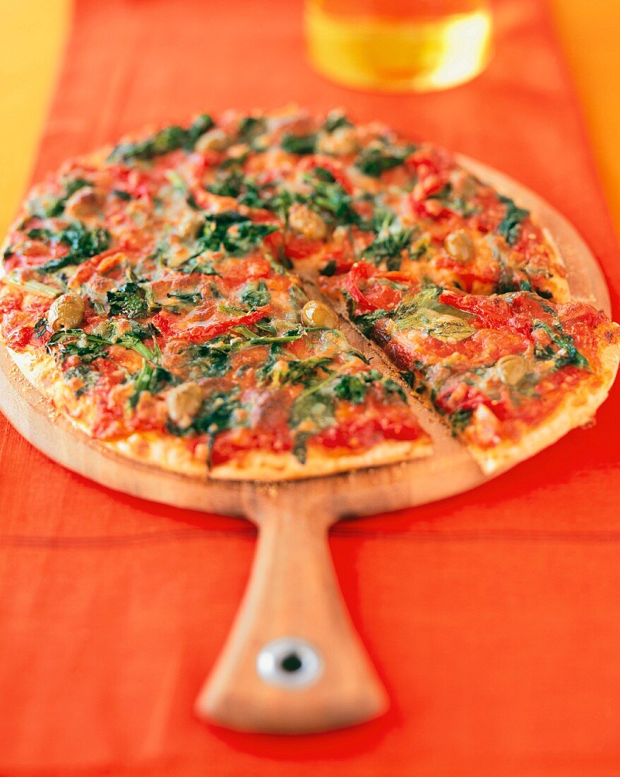 Broccoli Rabe Pizza on a Wooden Paddle