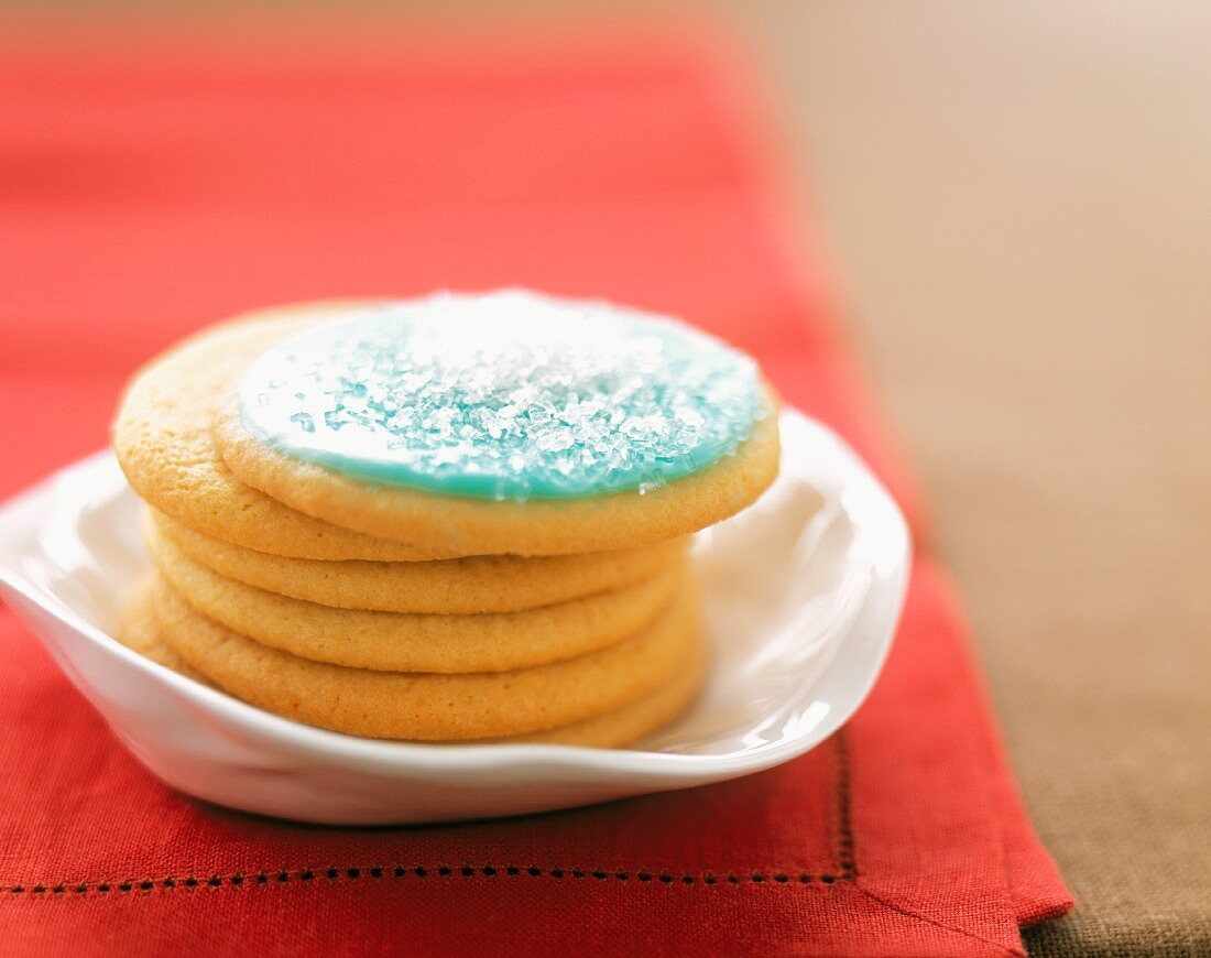 A Stack of Sugar Cookies with Blue Icing