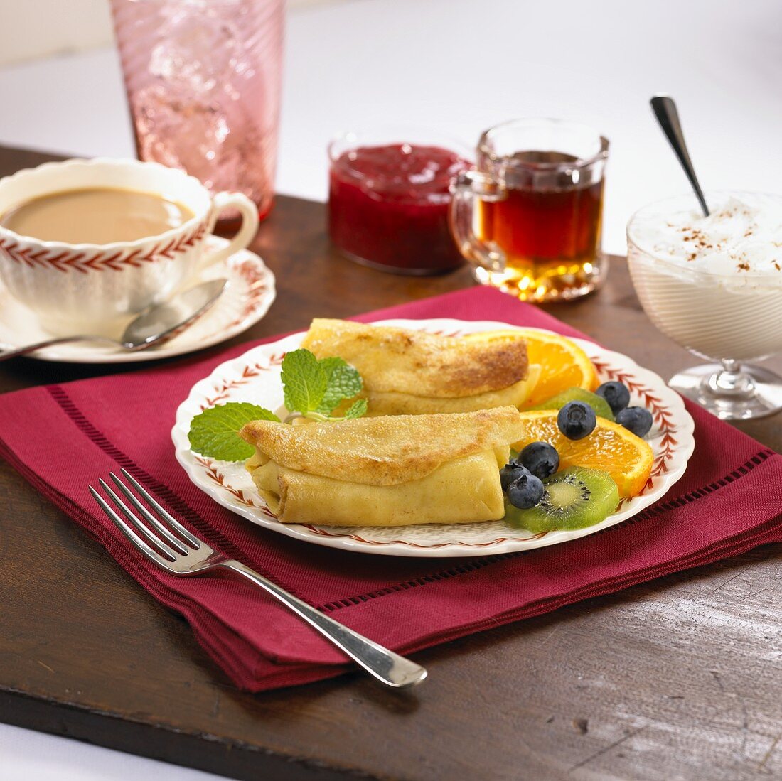 Cheese Blintzes with Fresh Fruit and Coffee