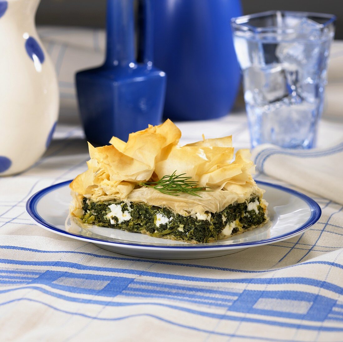 A Piece of Spinach and Feta Pie in Phyllo (Spanakopita)