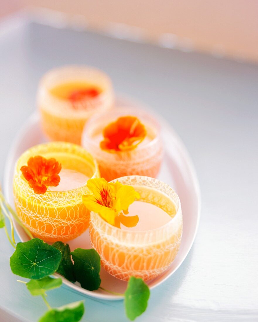 Tropical Punch in Glasses with Edible Flowers