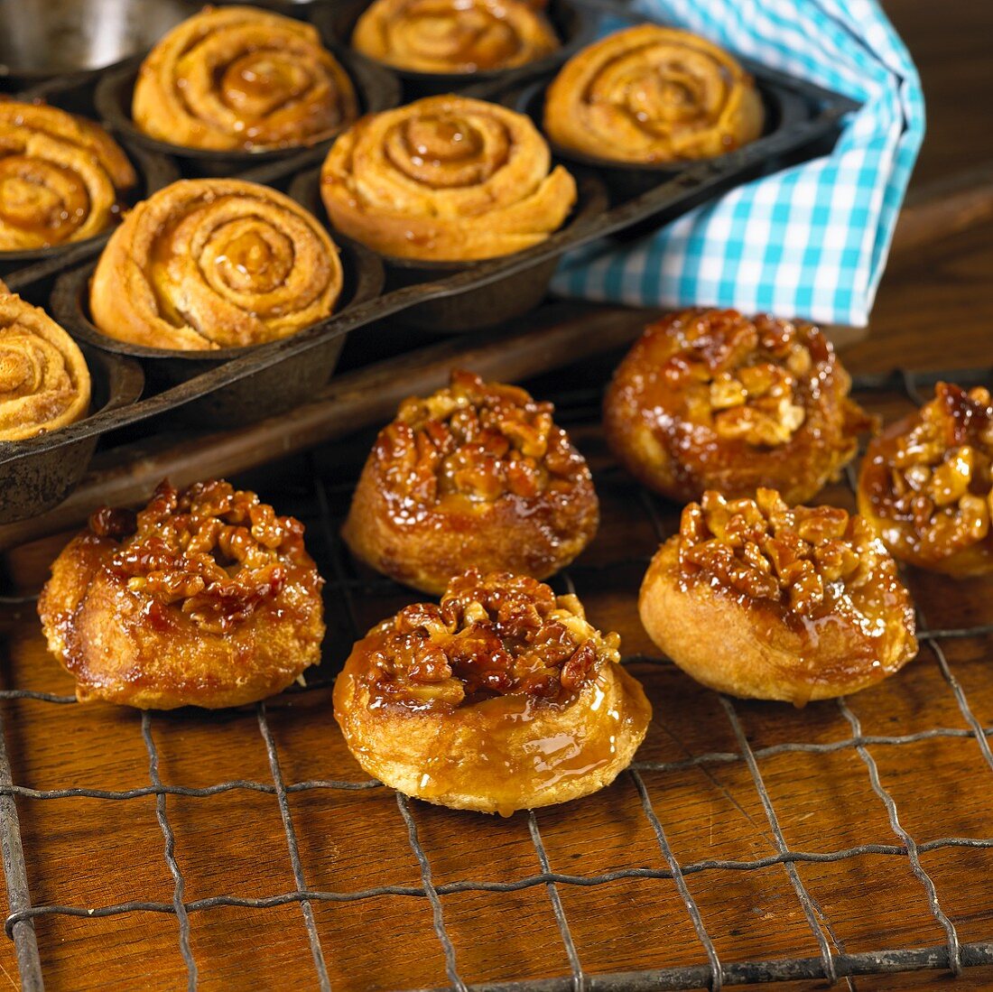 Pecan Sticky Buns on a Cooling Rack and in a Pan