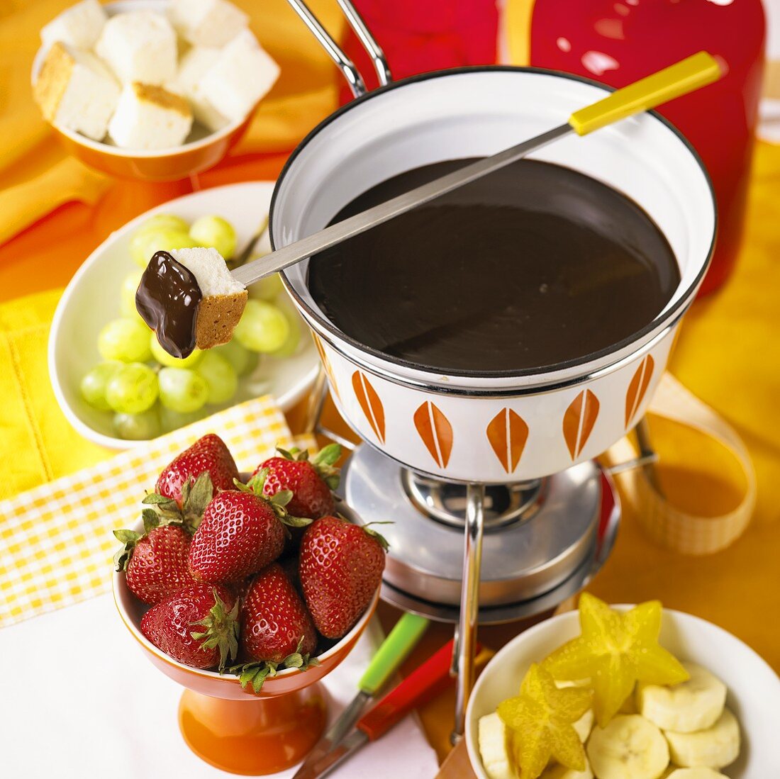 Chocolate Fondue with Fruit and Cake Squares