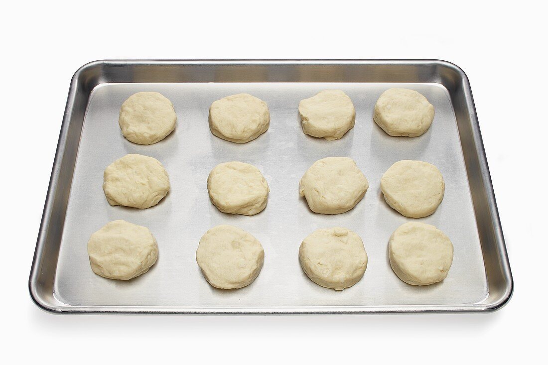 Unbaked Biscuits on a Baking Sheet