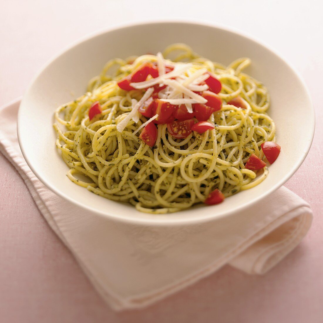Spaghetti with Pesto, Tomatoes and Parmesan Cheese