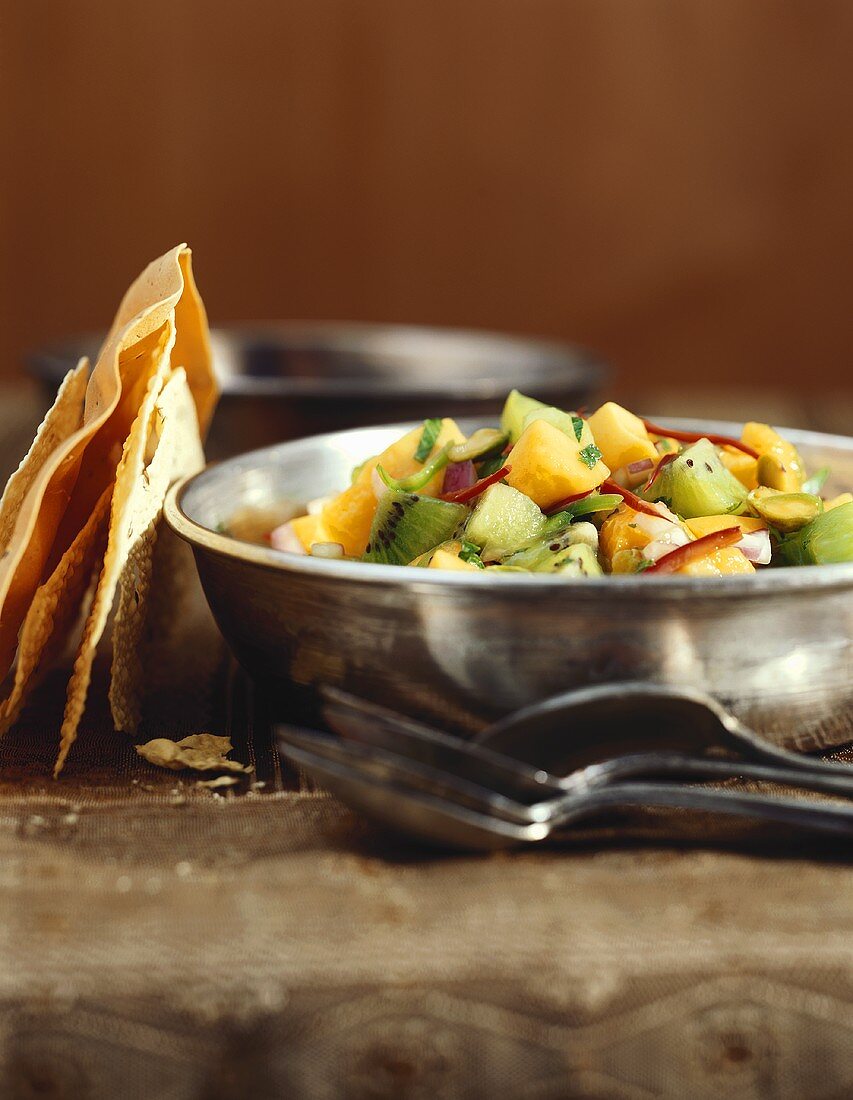 Mango, Kiwi and Red Pepper Salad in a Silver Bowl
