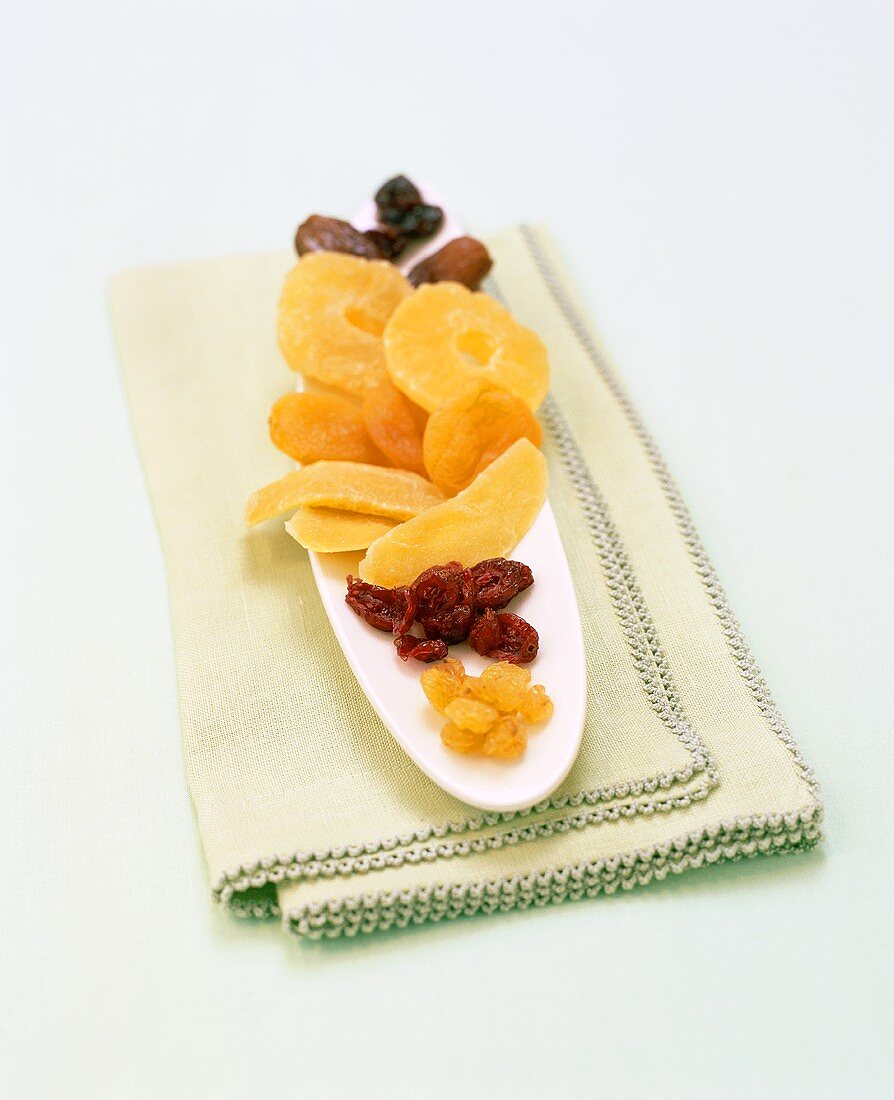 Assorted Dried Fruits on Green Linen