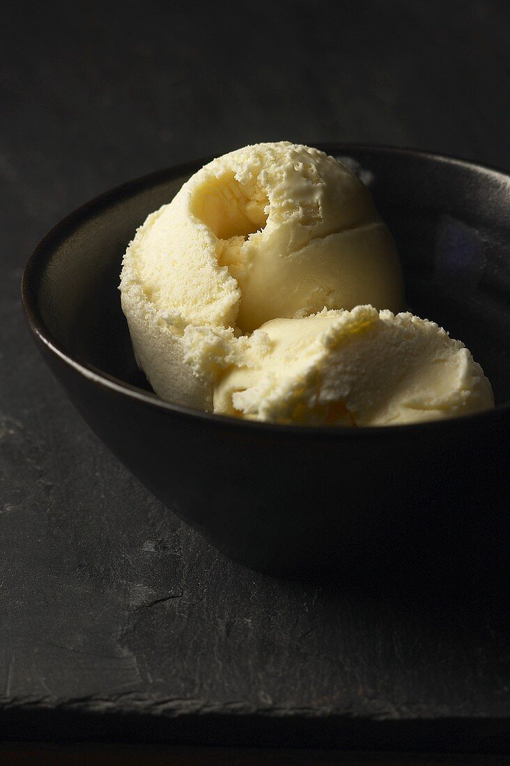 Vanilla Ice Cream in a Black Bowl