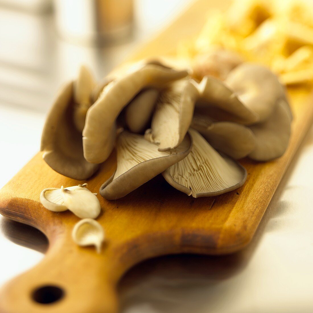 Oyster Mushrooms on a Wooden Board