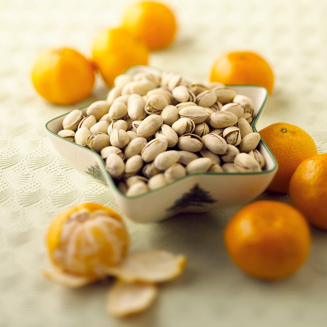 Pistachios in a Star Shaped Bowl with Clementines