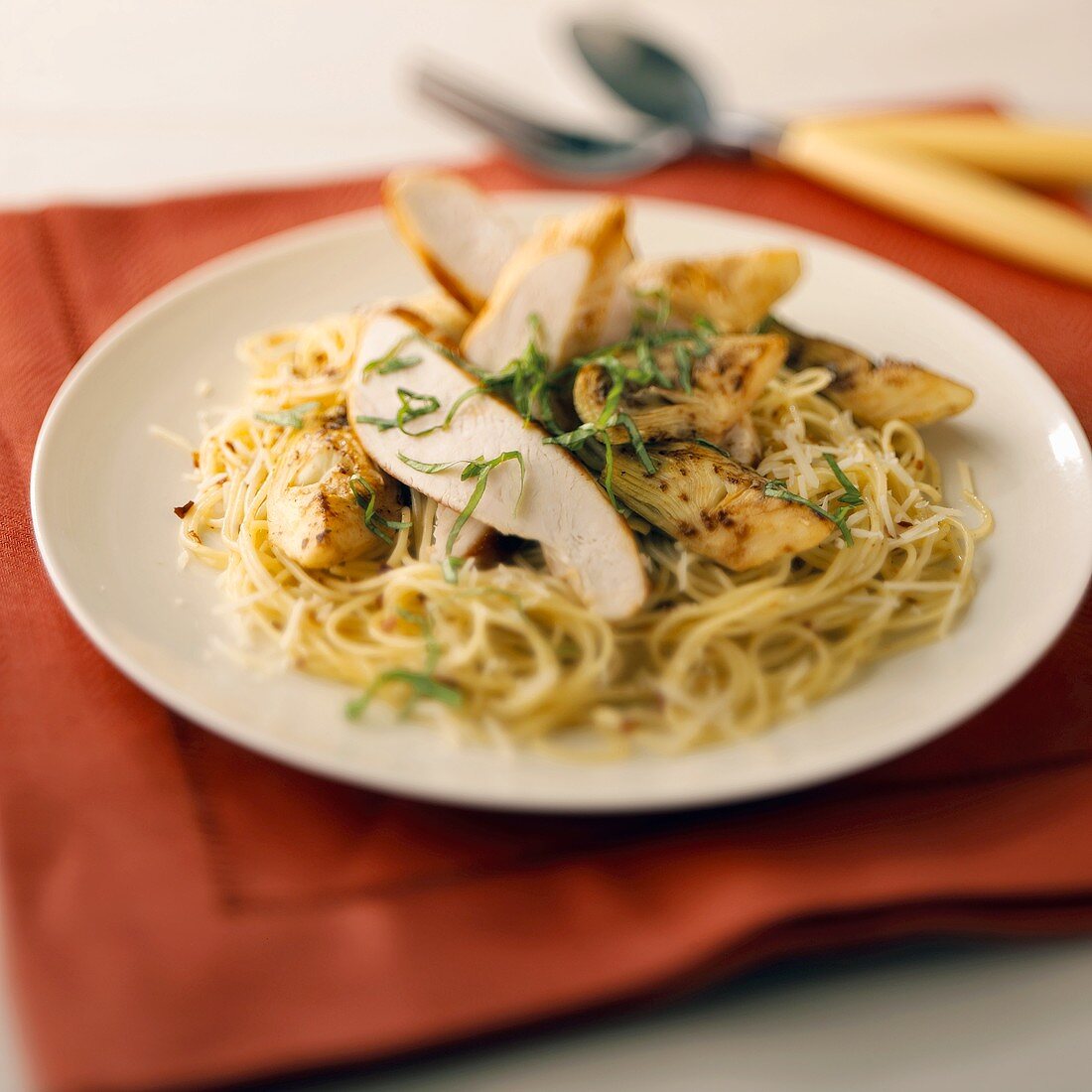 Angel Hair Pasta with Sliced Chicken Breasts and Artichoke